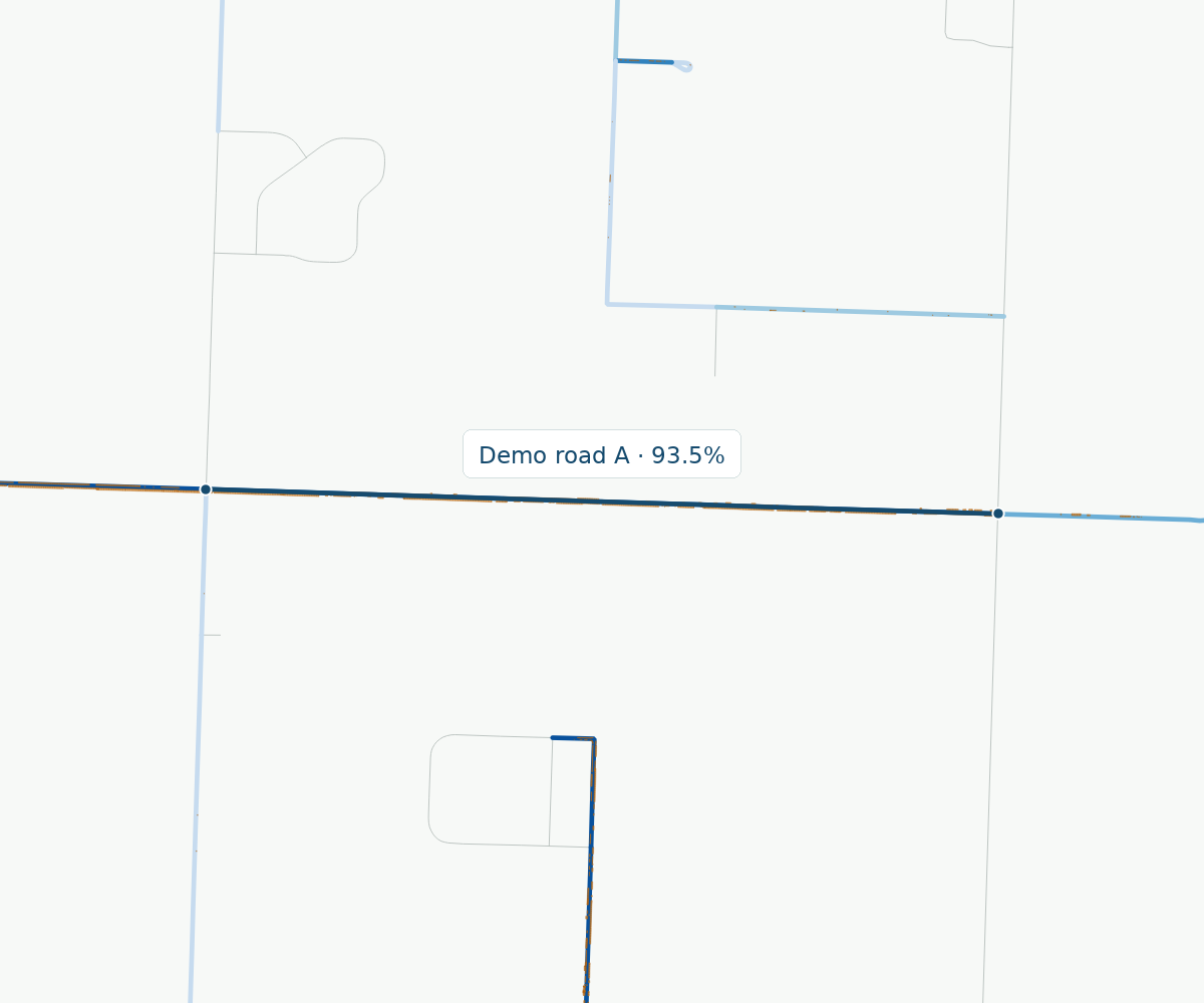Detail of road coverage with original orange spray footprints over blue road stretches.